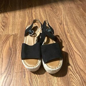Tan and black sandals